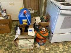 Yard blower in box, plastic kerosene can, antifreeze, motor oil, work gloves, misc
