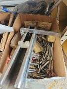 Contents of shelf: archery arrows and supplies
