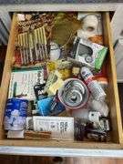Contents of drawer: household items