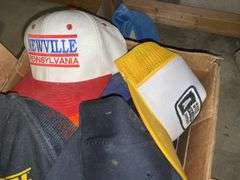 Box of baseball caps
