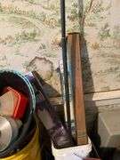 Garment rack, plasticware, tins, curtain rods, buckets, misc