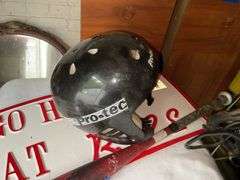 Pro-Tec skate helmet, GO HOGS sign, Louisville Slugger TPX baseball bat