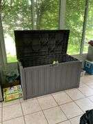 Plastic storage chest and contents 49in long