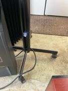 Rolling pedestal table - no contents, MUST COME DURING LAST 2 HOURS OF PICKUP FOR THIS ITEM.