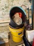 Garment rack, plasticware, tins, curtain rods, buckets, misc