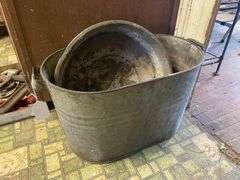 Oval galvanized tub and FarmMaster basin