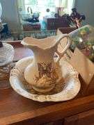Collectibles lot: green art glass vase, glass Peanut pattern oil lamp, Christmas and other figurines, light strings, figural egg timer, misc