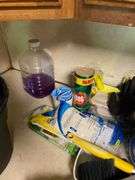Bucket, paper towels, rubber gloves, cleaning supplies, household items lot