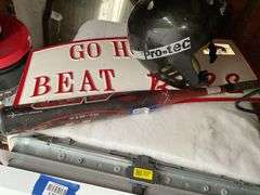 Pro-Tec skate helmet, GO HOGS sign, Louisville Slugger TPX baseball bat