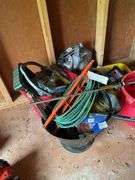 Coal bucket, plastic buckets, extension cord, bar clamp, paint roller, misc