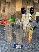 Eastman-Kodak graduated measure and vintage bottles