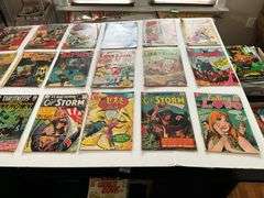 Comic books including: Lois Lane, Captain Storm, Army, Batman