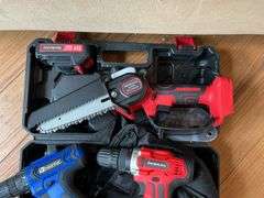 Cordless tool kit: two drills, mini chainsaw, charger