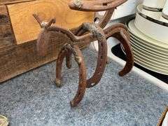 Wrought iron horseshoes cowboy on horse figure