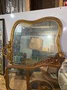 Mirrors lot: gilt Rococo framed, triple buffet mirror, round beveled, oval elephant frame