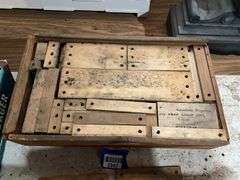 Antique toy wooden building set in wooden box w/ paper print on top of lid