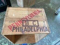 Two wooden advertising crates: Life Pears and Cutty Sark Whisky