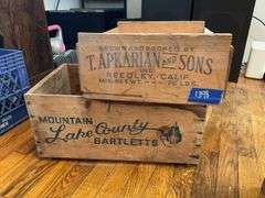 Two wooden advertising fruit crates