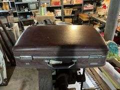 Vintage leather suitcase and Tourister suitcase