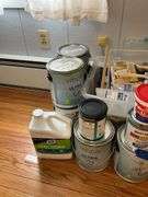 New paint brushes, scraper, paints, painting supplies
