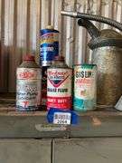 Vintage automotive advertising tins