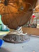 Antique electric heater w/ copper reflector, on cast iron base
