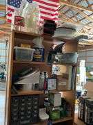 Contents of shelf unit: parts drawer cabinet, packing tape handle, hardware, misc
