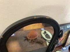 Schulze & Van Stee MFG. Co. Arched swivel dresser mirror on turned supports