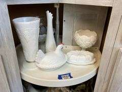 Contents of shelf: milk glass hen on nest, swung vase, compote, butter dish, grape vase, lamp base