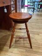 Cherry finish swivel stool w/ turned legs