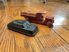 Toy lot including: litho tin Yellow Cab and tank, pressed steel truck, train signal, wooden trucks