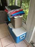 Two Coleman coolers and tote bags