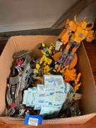 Toy lot including: Spider-Man car, WWE Sin Cara action figure, Transformers, misc