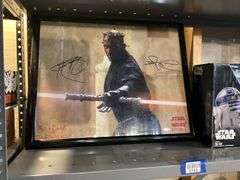 Contents of shelf: RC Star Wars R2D2 toy in box, Ray Park as Darth Maul framed print
