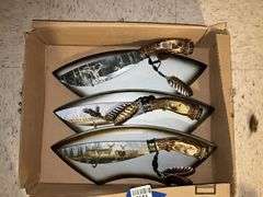 Three decorated wildlife knives/plaques