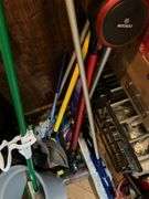 Contents of closet: MooSoo vacuum, Hoover upright vacuum, hand vac, cleaning supplies, Swiffer and refills, drawer unit, metal shelf unit, hangers, misc