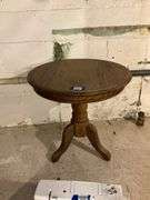 Round oak tripod table 24x24x25
