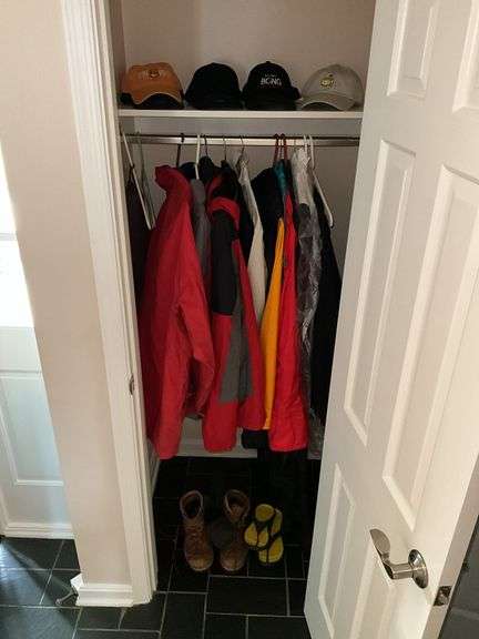 Contents of closet: caps, jackets, boots, sandals - jackets mainly sz: XXL