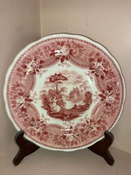 Contents of shelf: red Staffordshire transfer printed plates