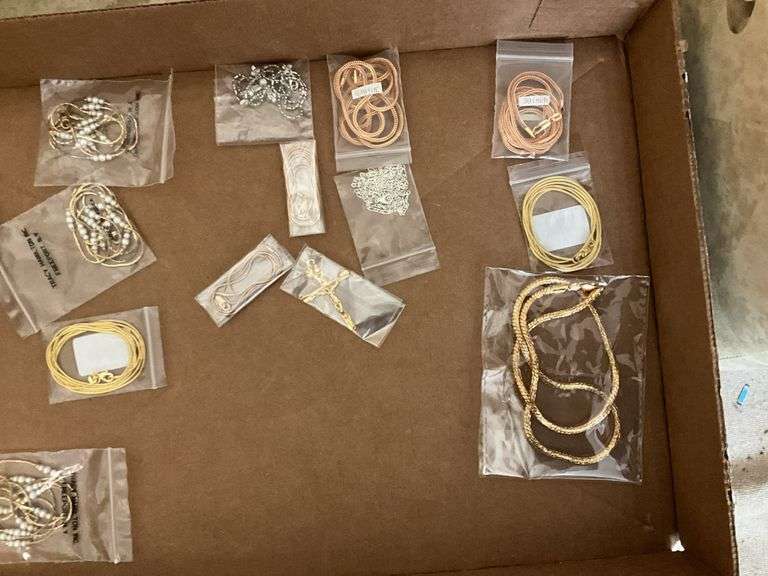 Costume jewelry: chains, necklaces, cross pendant