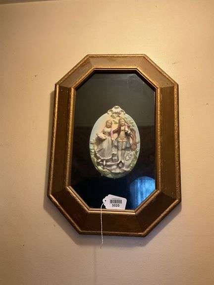 China plaque w/ couple in relief set in gilt frame 24x18