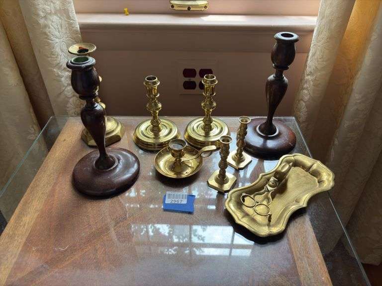 Brass and wood candleholders, wick trimmer on tray
