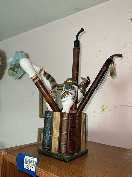 German style porcelain pipes in book theme container