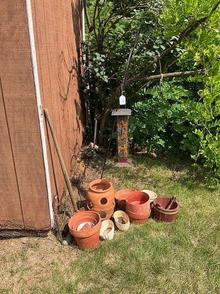 Shepherd's hook w/ birdfeeder, strawberry jar, flowerpots, planters