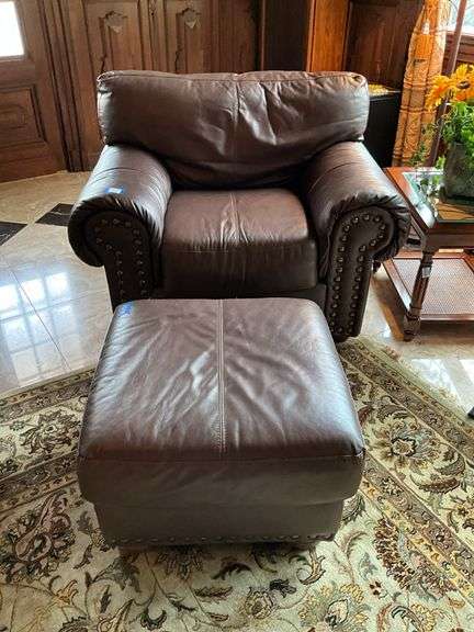 Brown leather club chair w/ tack head trim and matching ottoman, chair 46x36x32, ottoman 25x25x16
