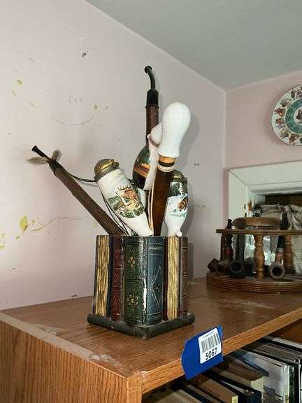 German style porcelain pipes in book theme container