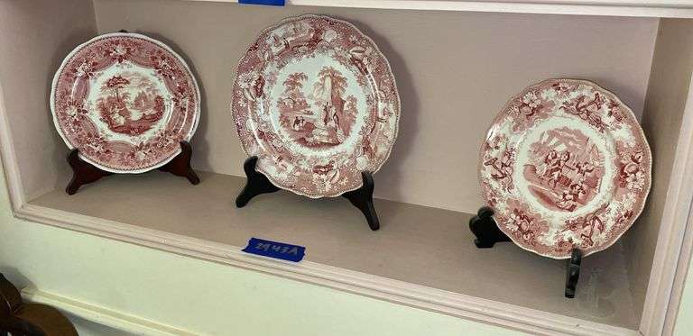 Contents of shelf: red Staffordshire transfer printed plates