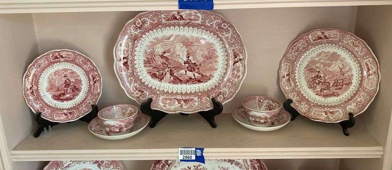 Contents of shelf: red Staffordshire transfer printed china platter, plates, cup/saucer, including Caledonia pattern