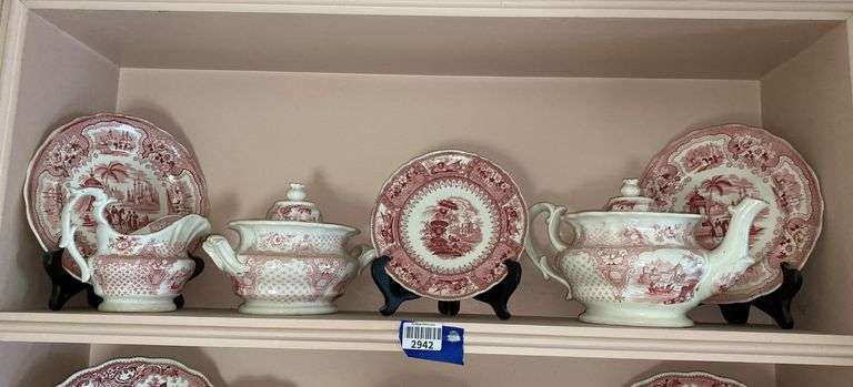 Contents of shelf: red Staffordshire transfer printed china teapot, sugar & creamer, plates