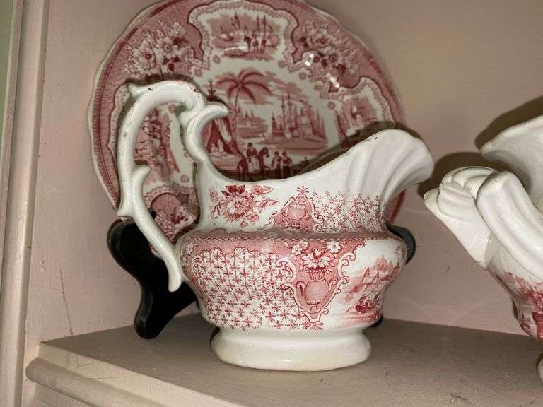 Contents of shelf: red Staffordshire transfer printed china teapot, sugar & creamer, plates